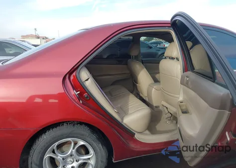 2003 Toyota Camry Le z USA, uszkodzony, nr VIN 4T1BE32K33U203726